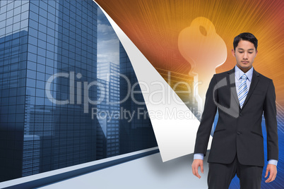 Composite image of serious asian businessman