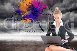 Composite image of businesswoman using laptop