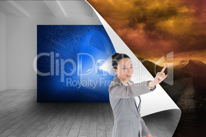 Composite image of smiling asian businesswoman pointing