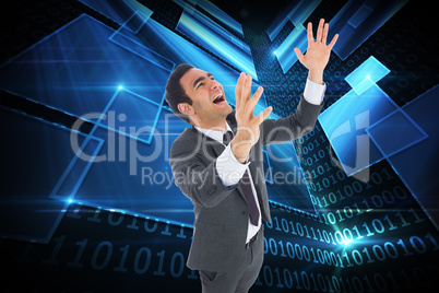 Composite image of excited businessman with arms raised