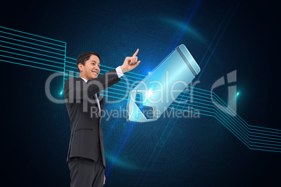 Composite image of smiling asian businessman pointing