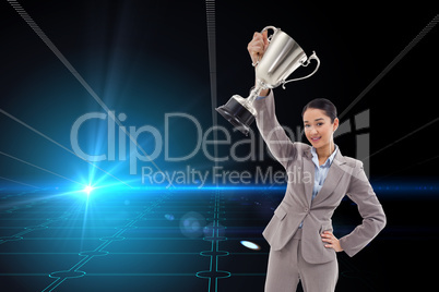 Composite image of businesswoman showing a cup