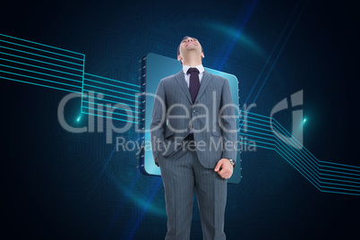 Composite image of businessman standing