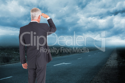 Composite image of rear view of mature businessman looking away