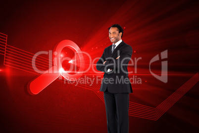 Composite image of businessman with folded arms