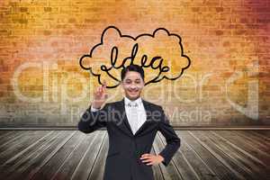 Composite image of smiling asian businessman pointing