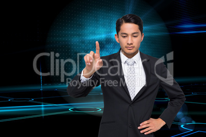 Composite image of unsmiling asian businessman pointing