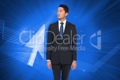 Composite image of serious asian businessman