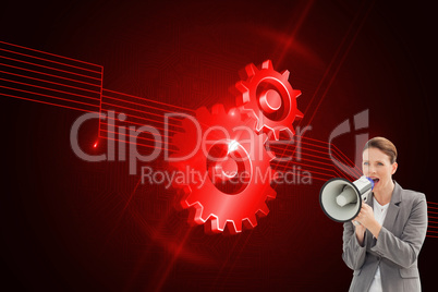 Composite image of businesswoman talking on a megaphone