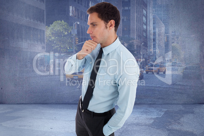 Composite image of thoughtful businessman with hand on chin