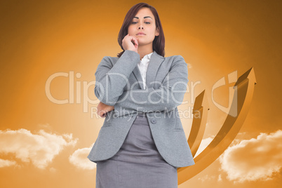 Composite image of focused businesswoman