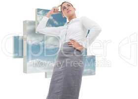 Composite image of thinking businesswoman