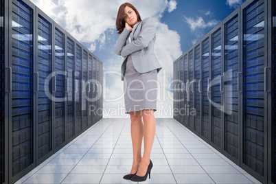 Composite image of focused businesswoman