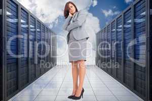 Composite image of focused businesswoman