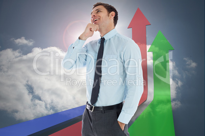 Composite image of thoughtful businessman with hand on chin