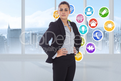 Composite image of serious businesswoman