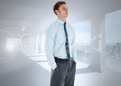 Composite image of serious businessman standing with hands in po