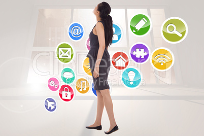 Composite image of asian businesswoman walking