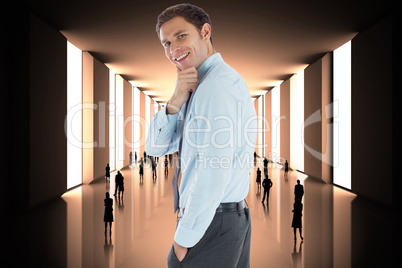 Composite image of thoughtful businessman with hand on chin