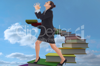 Composite image of angry businesswoman gesturing