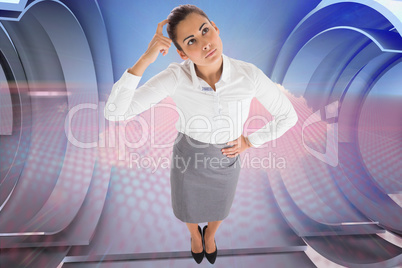 Composite image of focused businesswoman