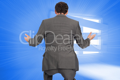 Composite image of businessman posing with hands out