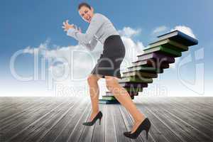 Composite image of furious businesswoman gesturing