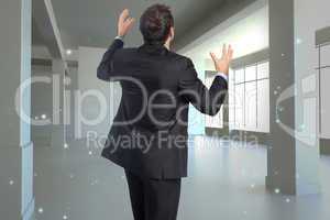 Composite image of stressed businessman gesturing