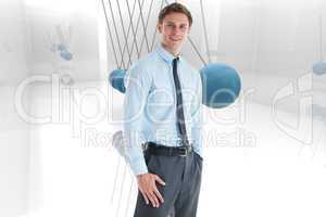 Composite image of smiling businessman standing with hand in poc