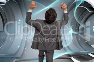 Composite image of businessman standing with arms pressing up