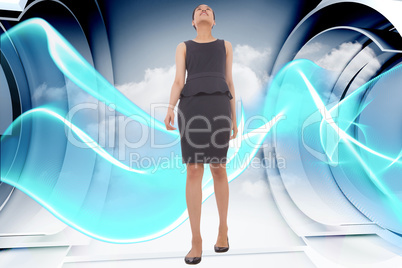 Composite image of asian businesswoman walking