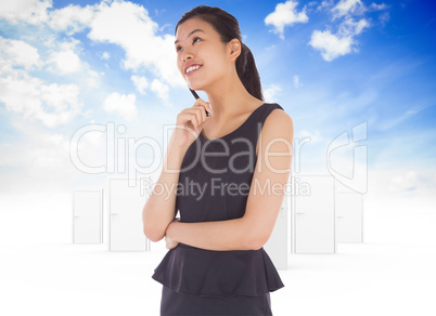 Composite image of thinking businesswoman