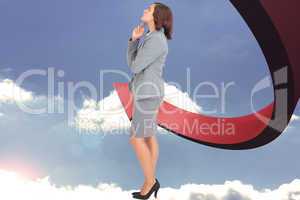 Composite image of focused businesswoman