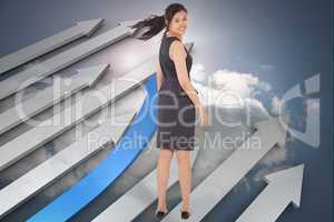 Composite image of smiling businesswoman