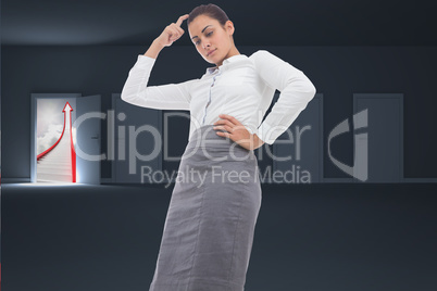 Composite image of thinking businesswoman