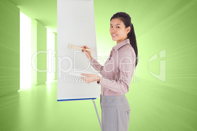 Composite image of businesswoman painting on an easel