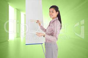 Composite image of businesswoman painting on an easel