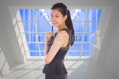 Composite image of thoughtful businesswoman