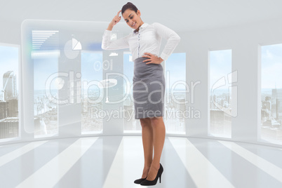 Composite image of smiling thoughtful businesswoman