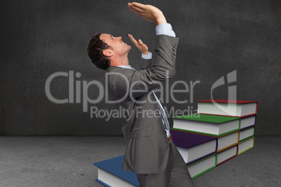 Composite image of businessman standing with arms pressing up