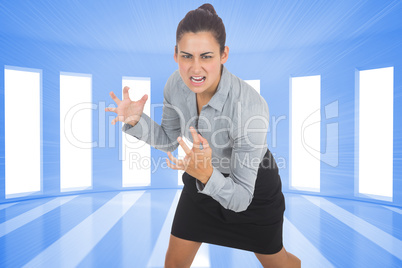 Composite image of furious businesswoman gesturing