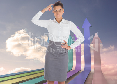 Composite image of focused businesswoman