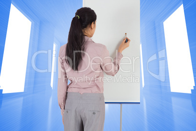 Composite image of businesswoman painting on an easel