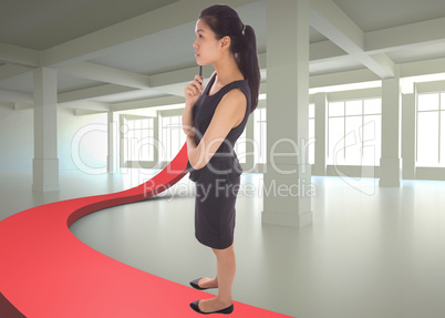 Composite image of thoughtful businesswoman