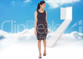 Composite image of asian businesswoman walking