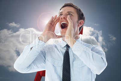 Composite image of businessman shouting