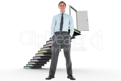 Composite image of happy businessman standing with hands in pock