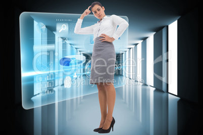 Composite image of focused businesswoman