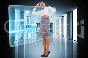 Composite image of focused businesswoman