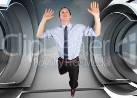 Composite image of businessman posing with arms raised